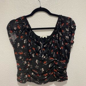 Black Floral Blouse with Red and White Accents